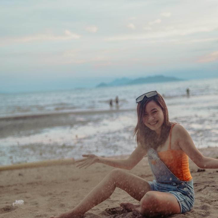 Alex Carter, Lead Design Curator at SimpleGrowthForward, reviewing corporate floral arrangements